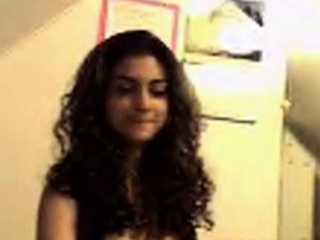 Sey young Indian babe on her webcam