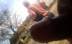 A great video of a guy jerking off near a woman waiting for