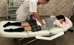Cute Japanese teen with a hot ass lies on her belly and get