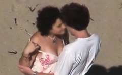 Couple In The Beach Making Love