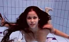 Paulinka underwater stripping babe