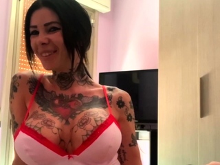 Busty Megan Inky shows off her ink during quarantine