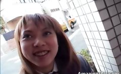 Cute asian schoolgirl sucking cock