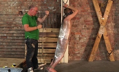 Old dominant guy strokes bound slaves cock and makes him cum